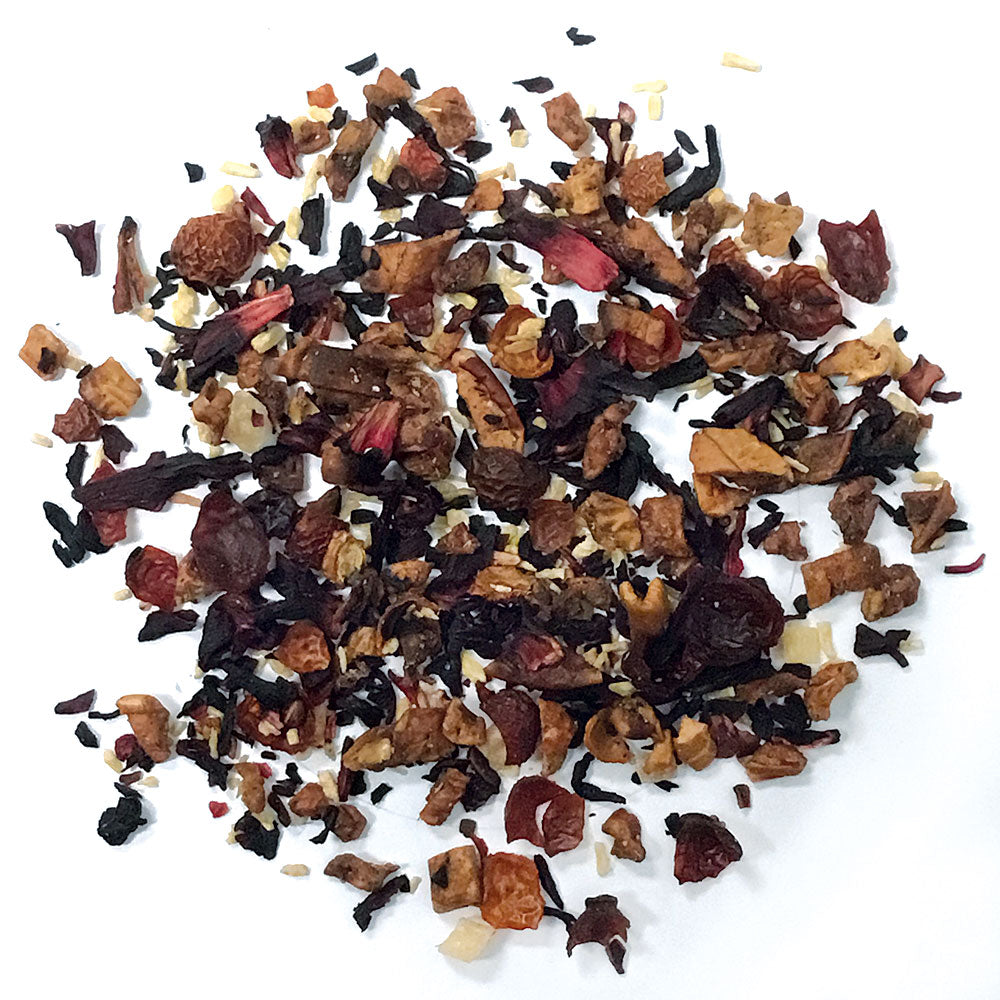 Piña Colada - Apple, hibiscus, rose hip peels, pineapple, coconut shreds and tropical essence. Silver Tips Tea's Loose Leaf Tea