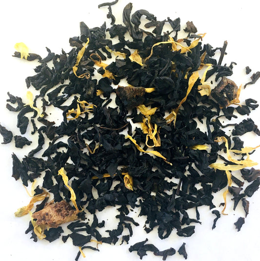 BLACK TEA, PEACH APRICOT FLAVORING, FRUIT BITS AND YELLOW FLOWERS