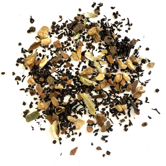 Black tea, pepper, cloves, ginger, cinnamon, green cardamom with spice and vanilla flavoring.