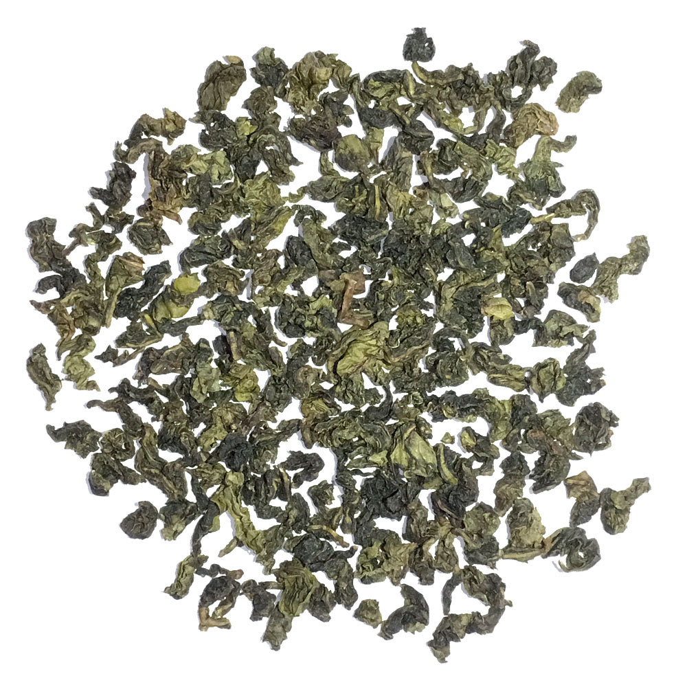 Ti Kwan Yin - Oolong - a very pleasant mellow taste with a faint note of natural smokiness with a good finish without astringency - Silver Tips Tea's Loose Leaf Tea