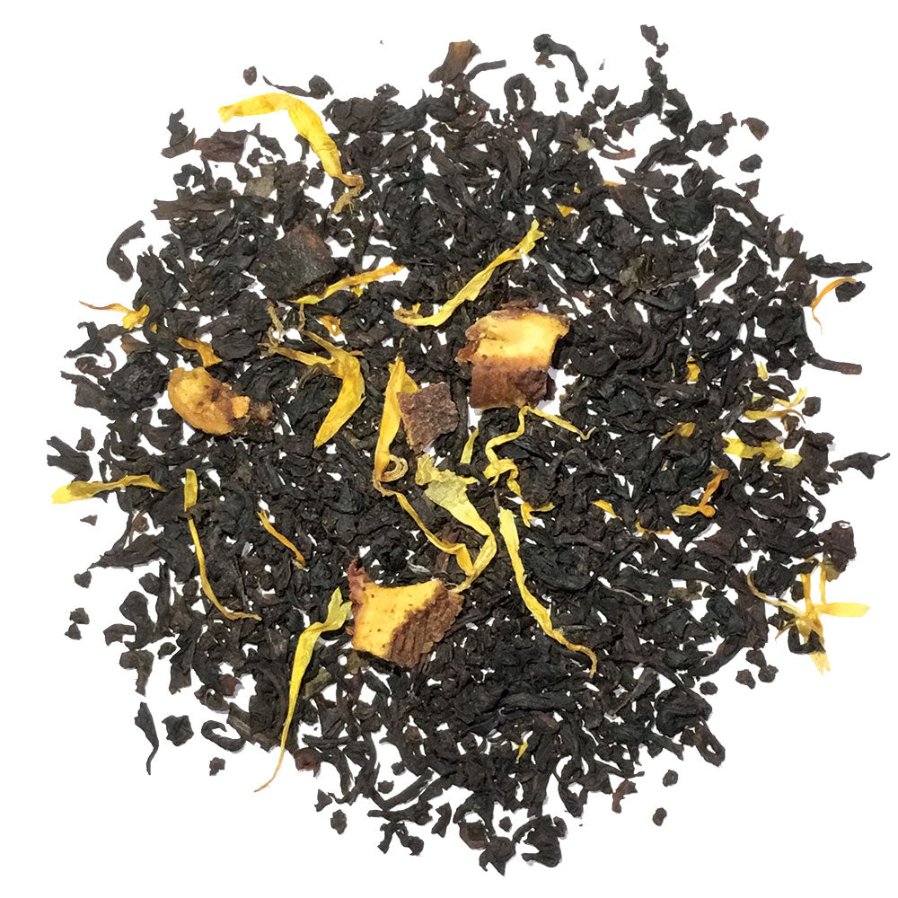 Peach - Black tea with peach flavoring and peach pieces, blended with marigold flower petals. Silver Tips Tea's Loose Leaf Tea